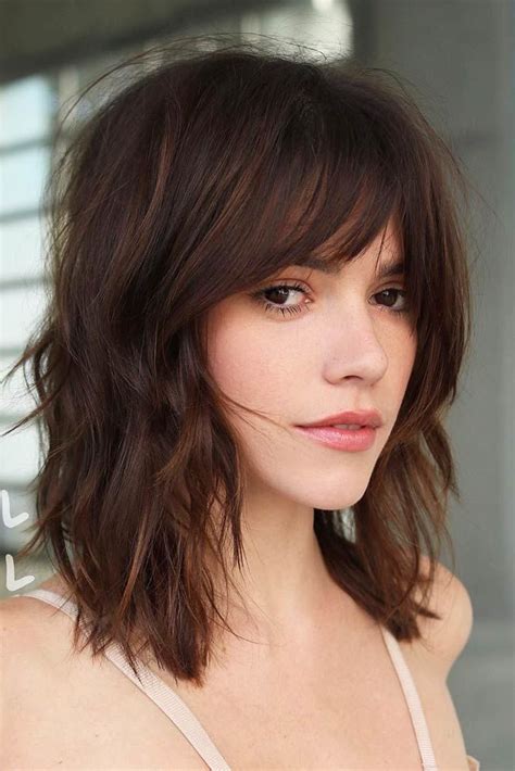 cute medium length hairstyles with bangs